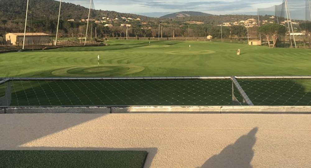 Vancouver Synthetic turf beside natural grass golf course