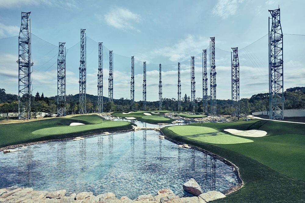 Vancouver Synthetic grass golf course with water and tall metal towers